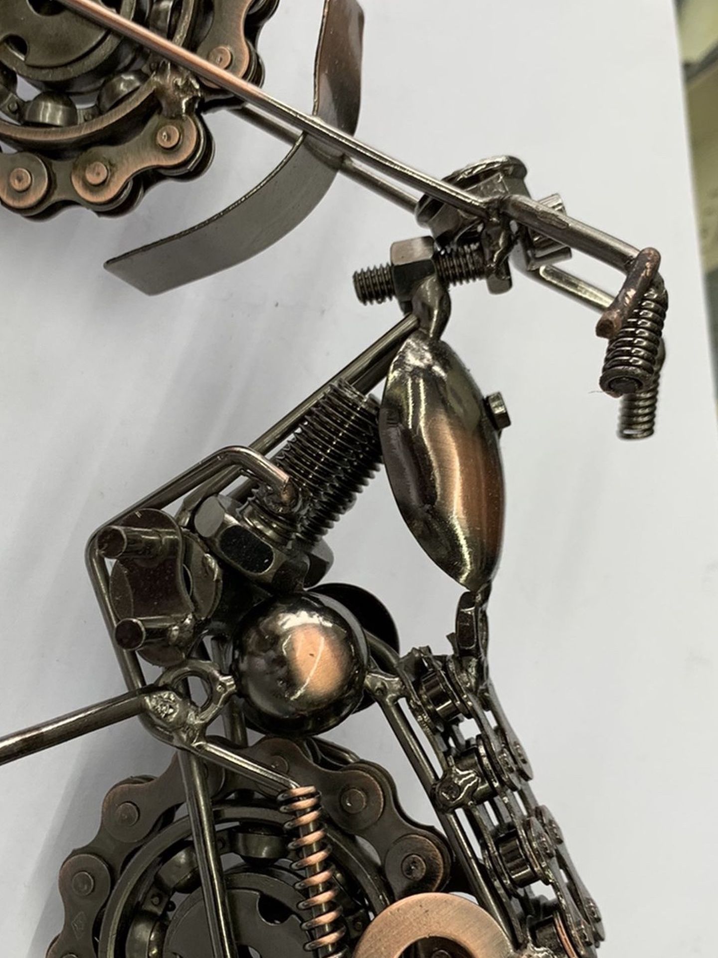 This sleek, handsome motorcross bike is designed by Mexico’s Armando Ramirez. He crafts it by hand with an intriguing assortment of metal pieces, ther