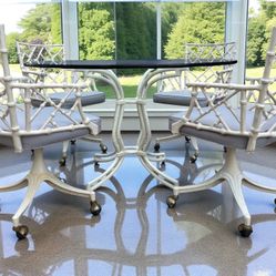 Phyllis Morris for Kessler Dining Table and 4 Swivel Chairs With Rolling casters.