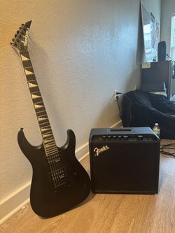 BARELY USED GUITAR AND AMP