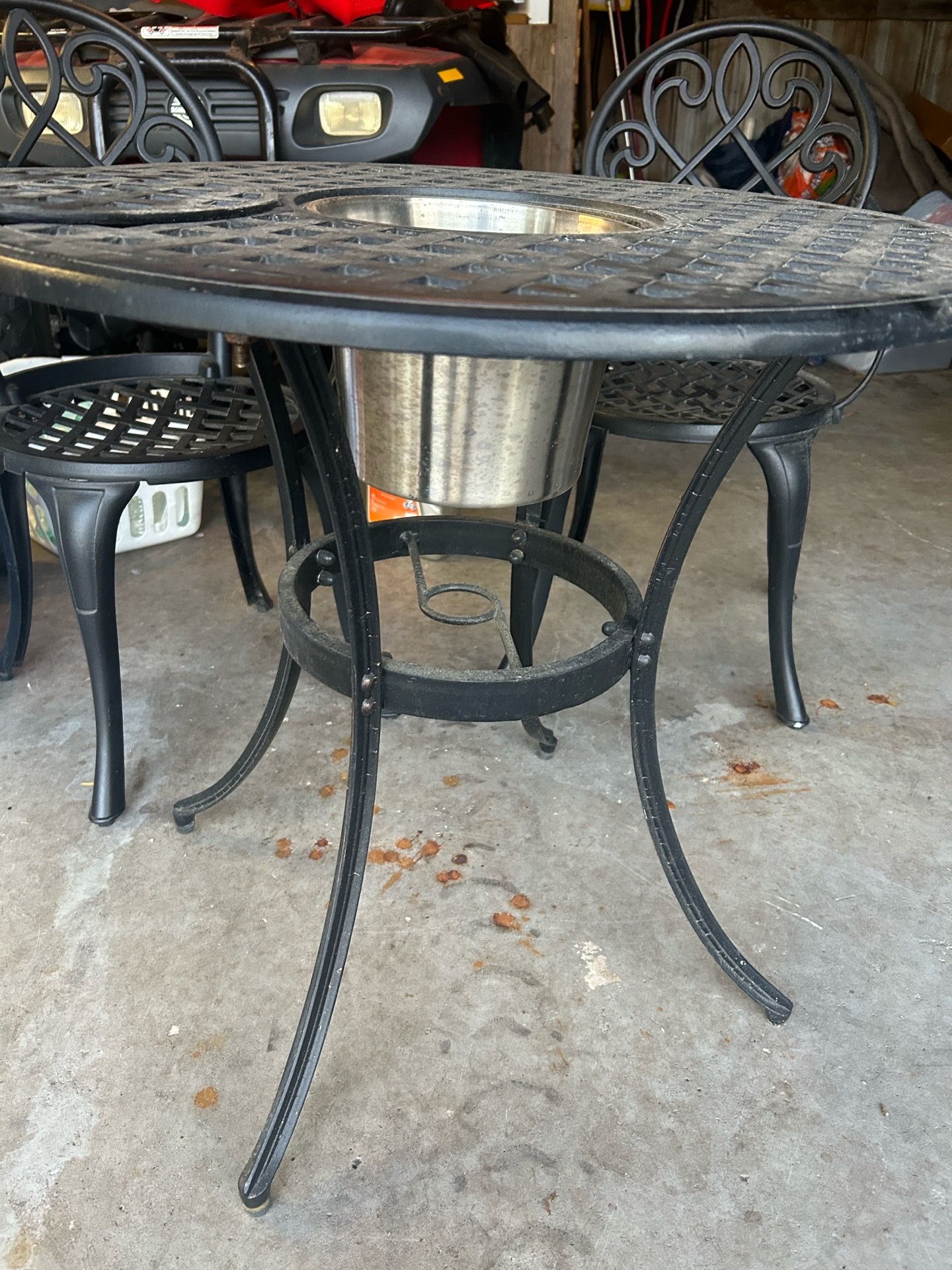 Cast aluminum? Cafe table and chairs