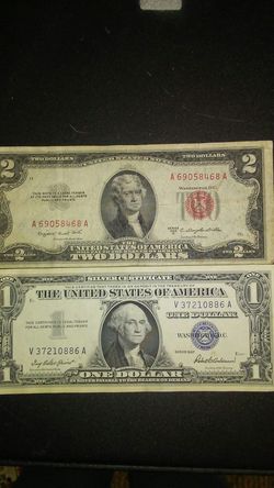 1953 Red Stamped 2 dollar bill and a 1957 1 dollar Silver Certificate.