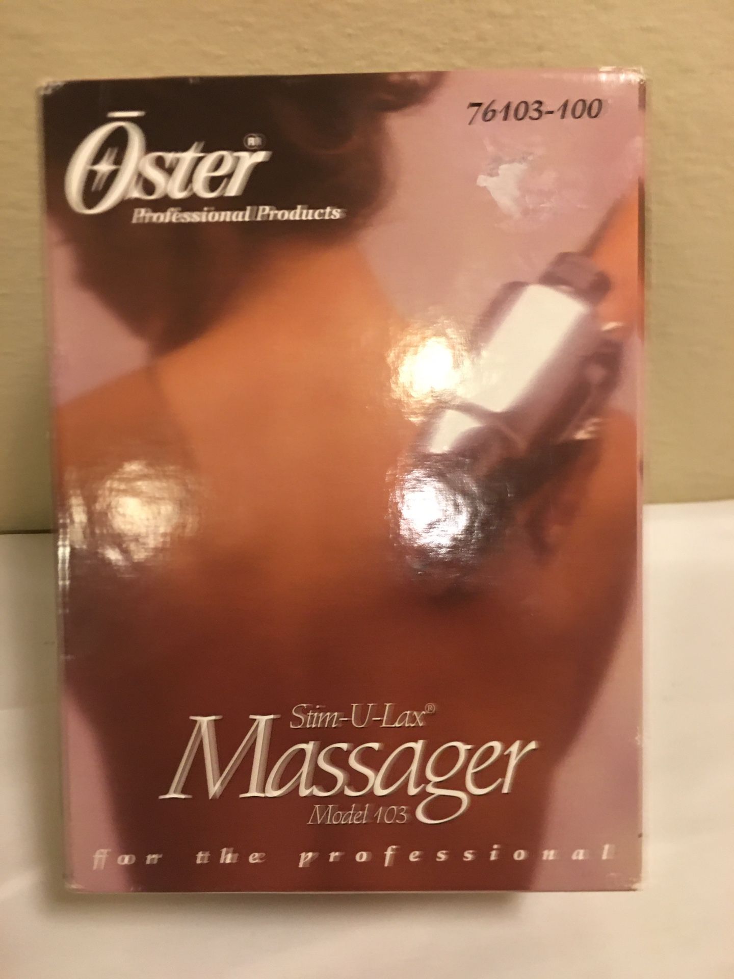 Oster professional Stim-U-Lax Massager Model # 103. Rubber hand pad, chrome housing.