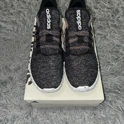 Size 8.5, men’s brand new unworn Adidas shoes with tags and box