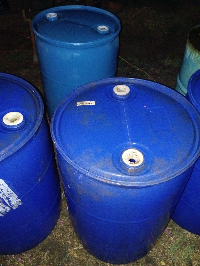 55 Gallon Drums. 4 Plastic One steel.