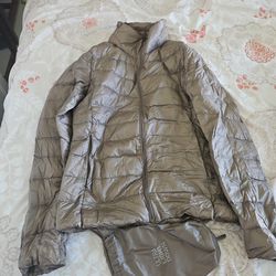 Uniqlo Women's ultra light down with packable bag, size small