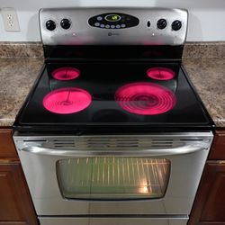 MAYTAG, STAINLESS STEEL ELECTRIC STOVE.