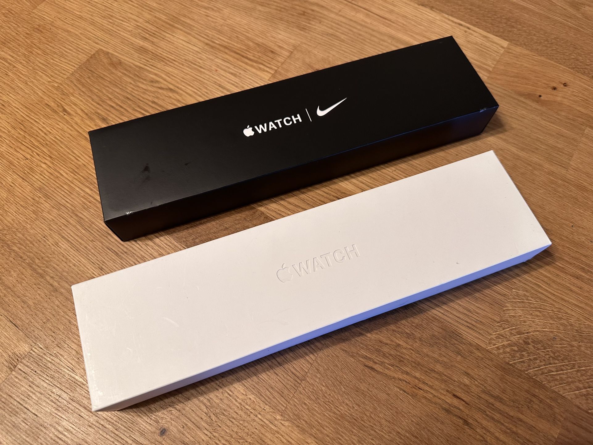 Two Apple Watches - Series 6 and Series 7