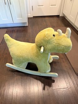 Plush rocking triceratops for small child or toddler