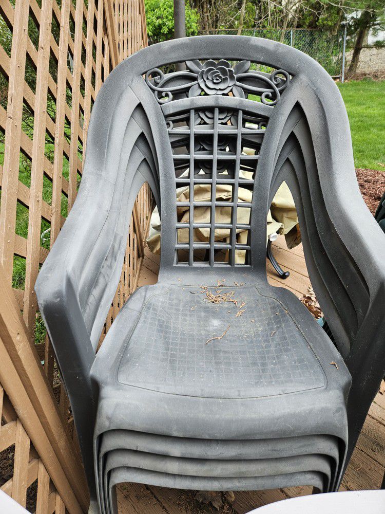 4 Gray Plastic Deck Chairs 