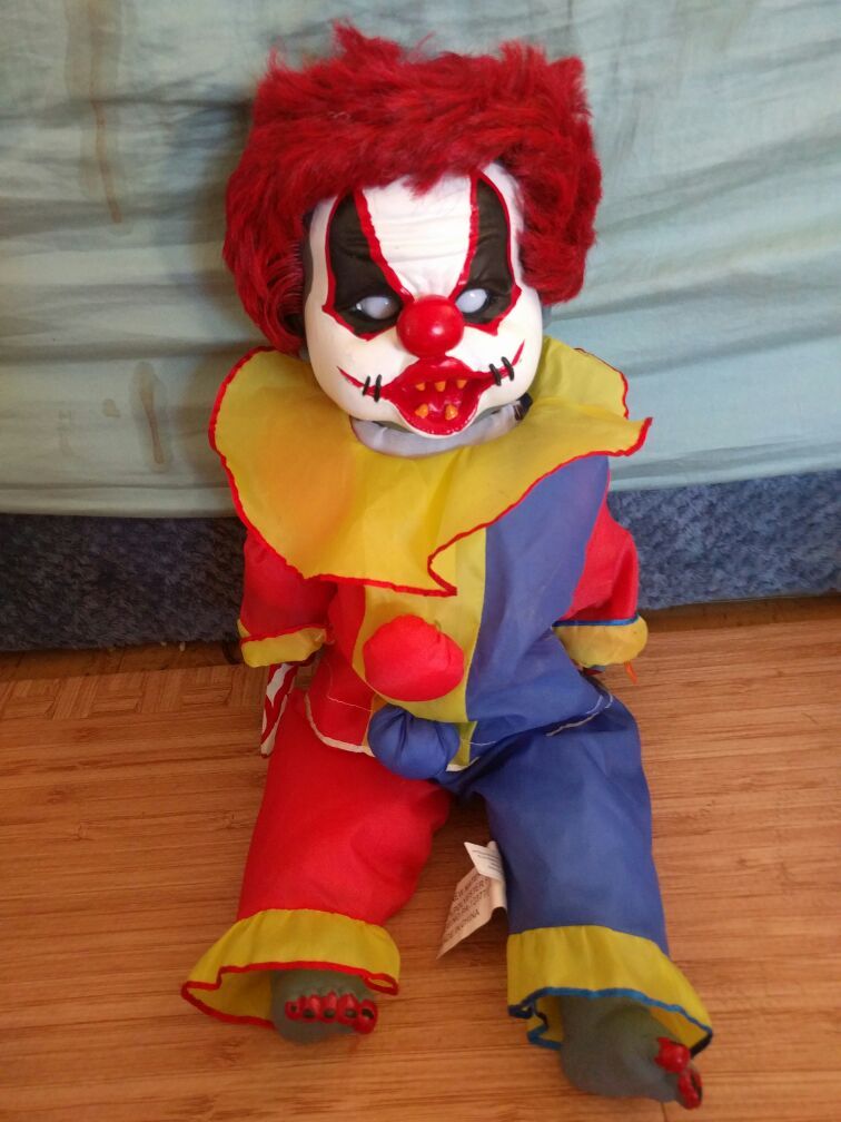 Ouchy motion activated clown baby