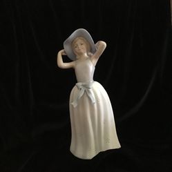  Lovely Young girl porcelain collectible figurine   Blue hat  With Pink Flower - $15