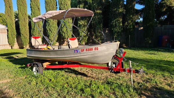 12ft sea nymph aluminum boat w/ new trailer, 15hp evinrude