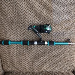 SOUGAYILANG 180 TRAVELING FISHING ROD AND REEL.  CARBON FIBER.  20" EXPANDS TO 6 FT.  NEW.  PICKUP ONLY