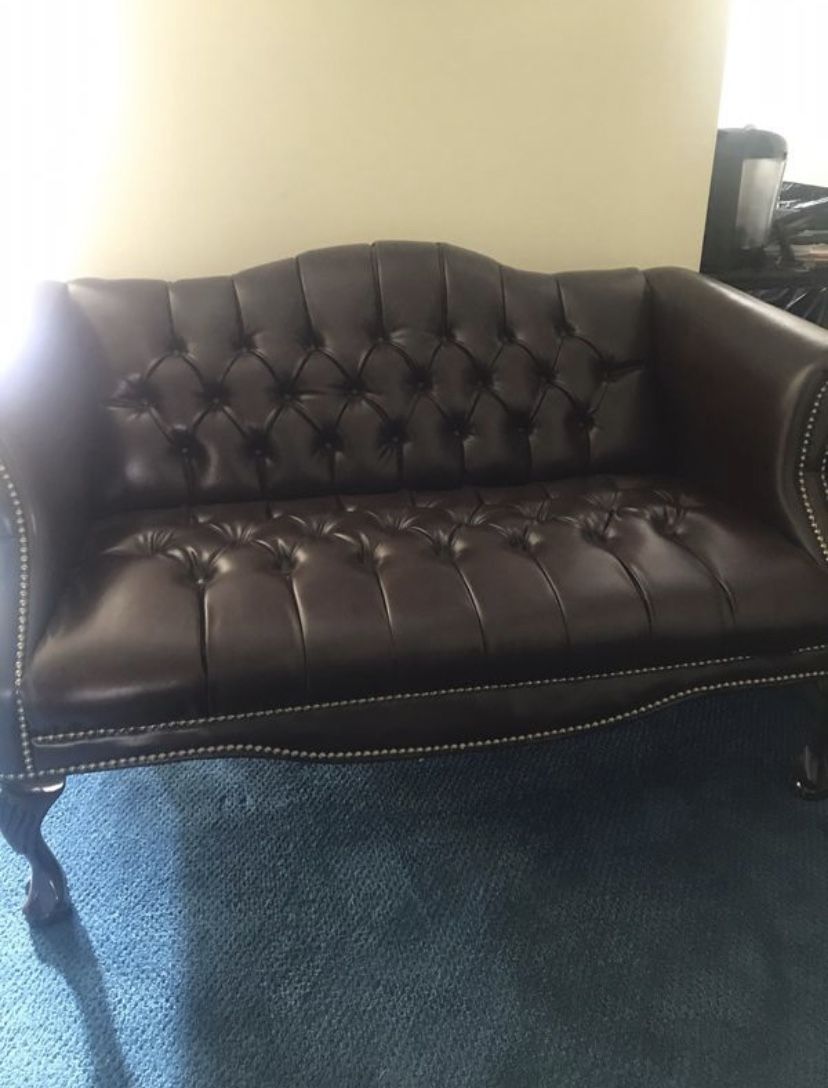 Executive love seat. Seats 2. Excellent condition for office. Sits in office that is never used.