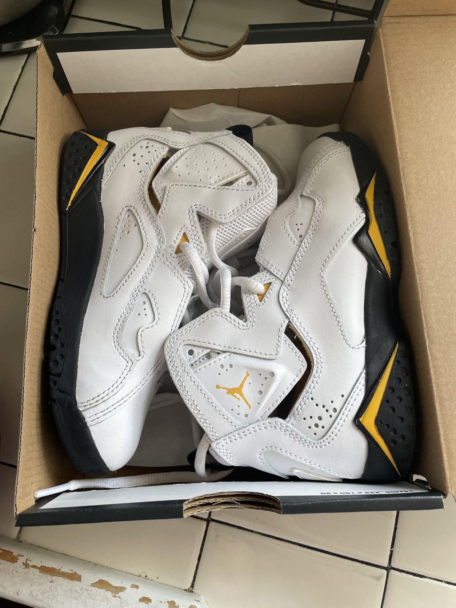 White Yellow and Black Jordan’s