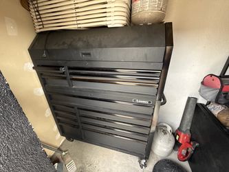 Husky tool box. 52in. W x 20in. D.