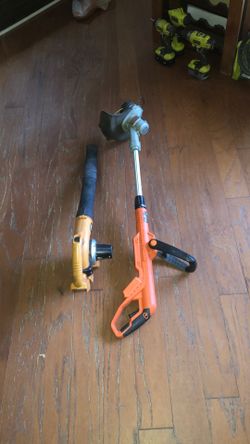 Black and Decker weedwacker and blower 20 volt lithium batteries and charger