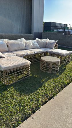 This 7-piece outdoor sectional sofa set brings flexible seating and a clean