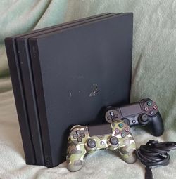 PS4 Pro 1TB with two controllers