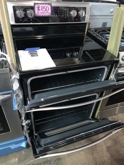 New WHIRLPOOL double oven electric range with 6 months warranty