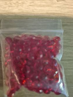 84 red glass beads
