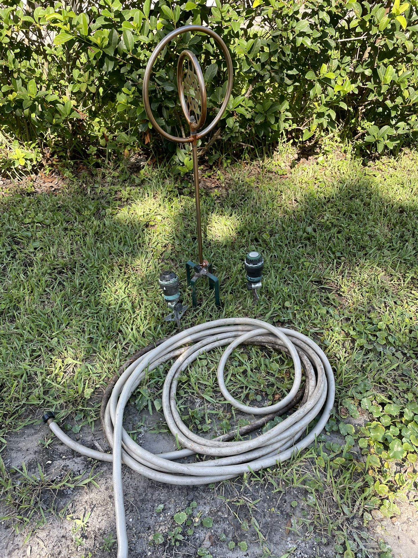 3- Sprinklers And A Garden Hose