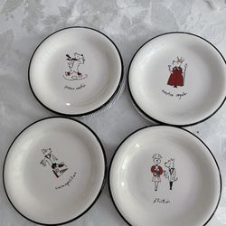 Set Of Four “Cosmopolitan”  Plates ,  new 