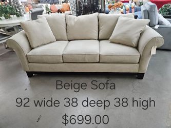 Beige 3-Seat Upholstered Sofa We are located at 2811 East Bell road. Another Time Around Furniture.