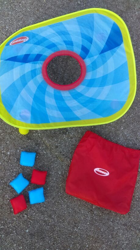 Fun toss game for swimming pools
