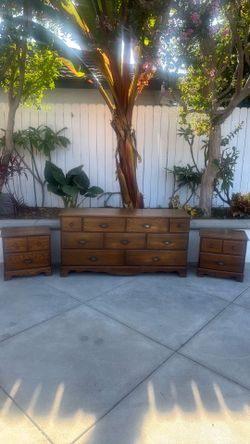 Dresser and two night stands.