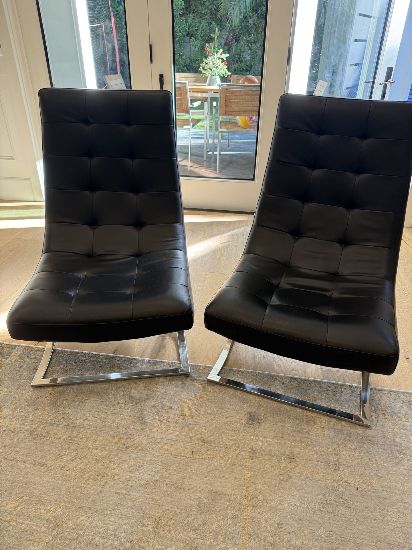 Pair Of Black Leather Chairs