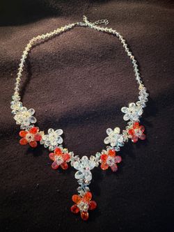 Crystal necklace with an orange blossom design