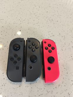 Three Nintendo switch joy-cons