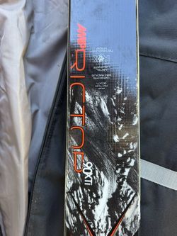 Men's ski package--skis/bindings, boots (new), Helmet (new)