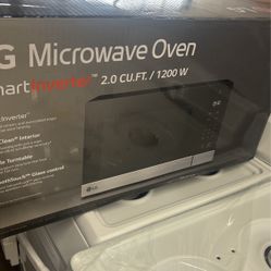 NEW LG MICROWAVE OVEN 