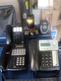 Selling 3 telephones, 1 pencil sharpener, 1 alarm clock and a 1 couzie for can drinks