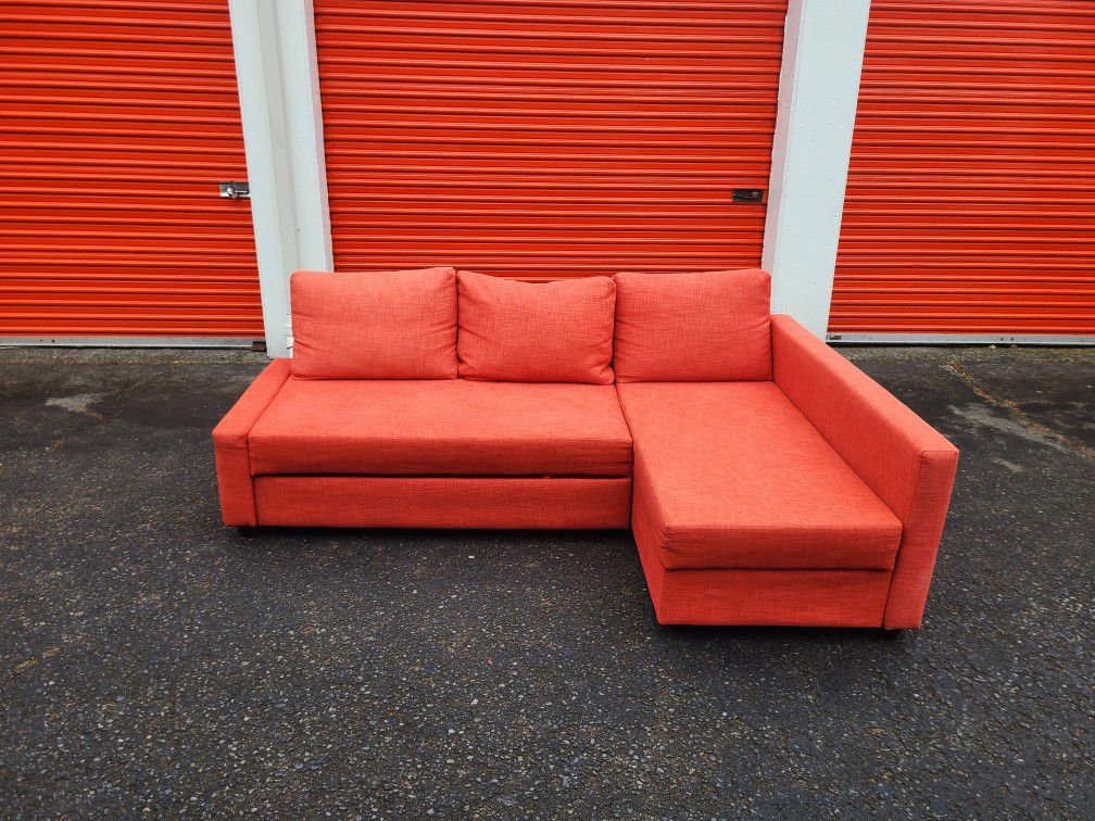 Orange Sleeper Sectional Couch w/Storage - Free Delivery