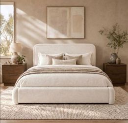 King Bed Frame, Cloud Boucle Headboard, Cream
Soft boucle and rounded edges create a low-profile cloud look. Wooden slats support the mattress without