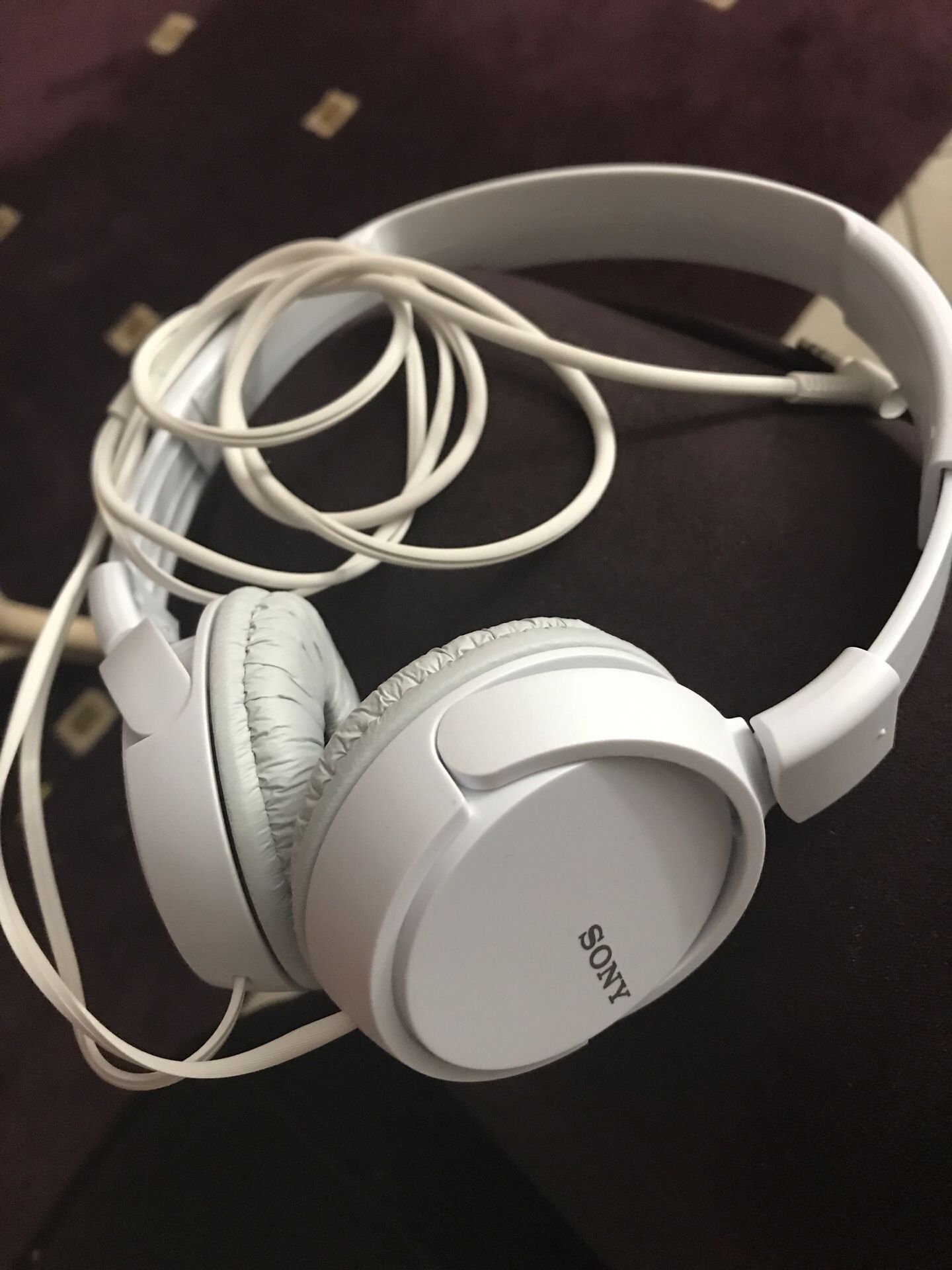 White Sony headphones .