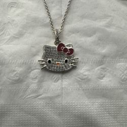 Hello Kitty necklace And charm. 