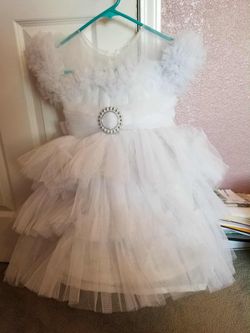 Beautiful white dress for girls it's brand new never used it