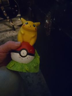 Pikachu on Pokéball Figure Statue