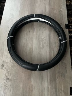 Black leather steering wheel cover with rhinestones