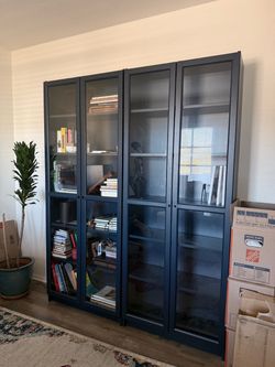 Pair of IKEA BILLY Bookcases with Glass Doors – Dark Blue Glass-Door Cabinets (Matching Set)