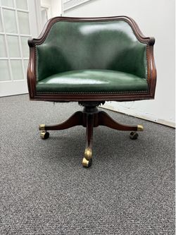 4 Chairs in good condition, swivel 360 degrees.
