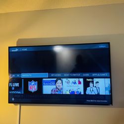 Vizio 70” Smart Tv With Smart Firestick Mounted With Remotes