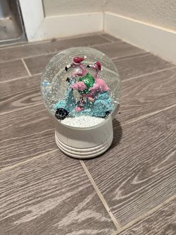 Pink Flamingo Christmas Snow Globe – $10