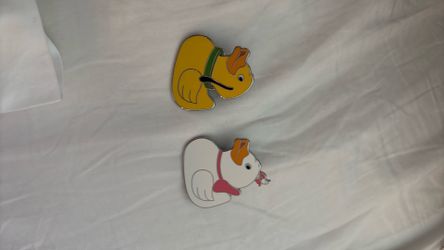 2 Disney pins from the duck collection