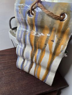 Handmade pottery wall art, signed by artist