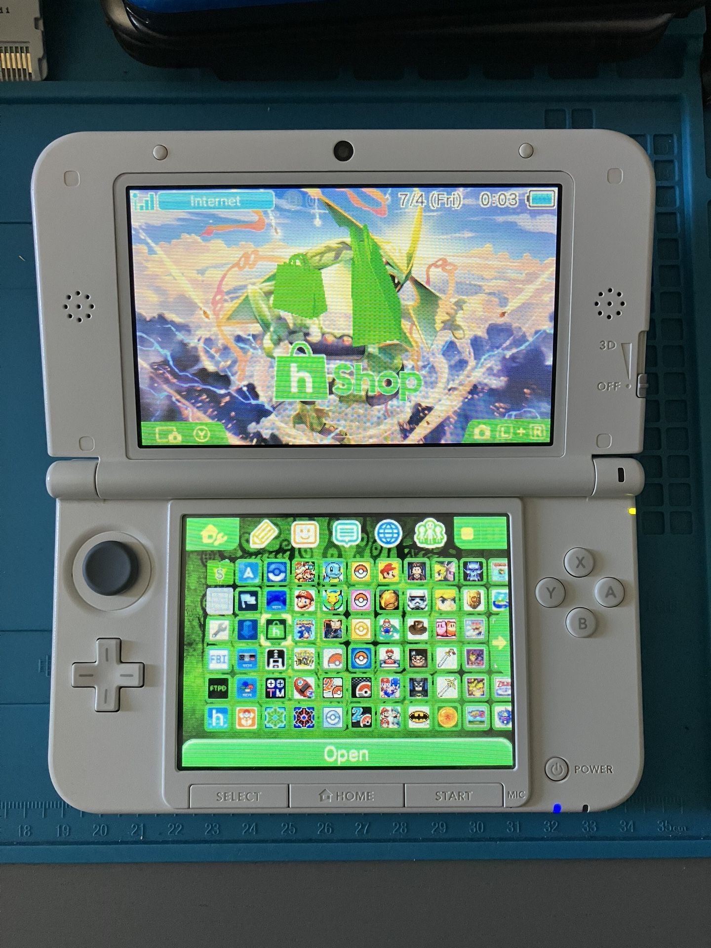 Nintendo White 3DS XL With Pokemon Bank, Pokemon DS, Stylus, 64 GB SD Card